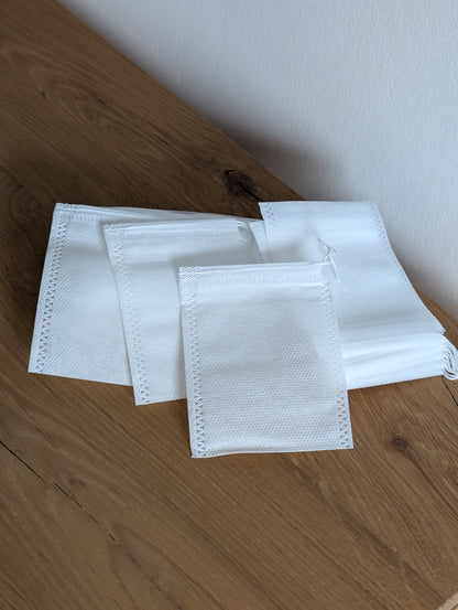 Anzünder Komplettsett - Schaufel + Sägemehl + 50 Teebeutel
